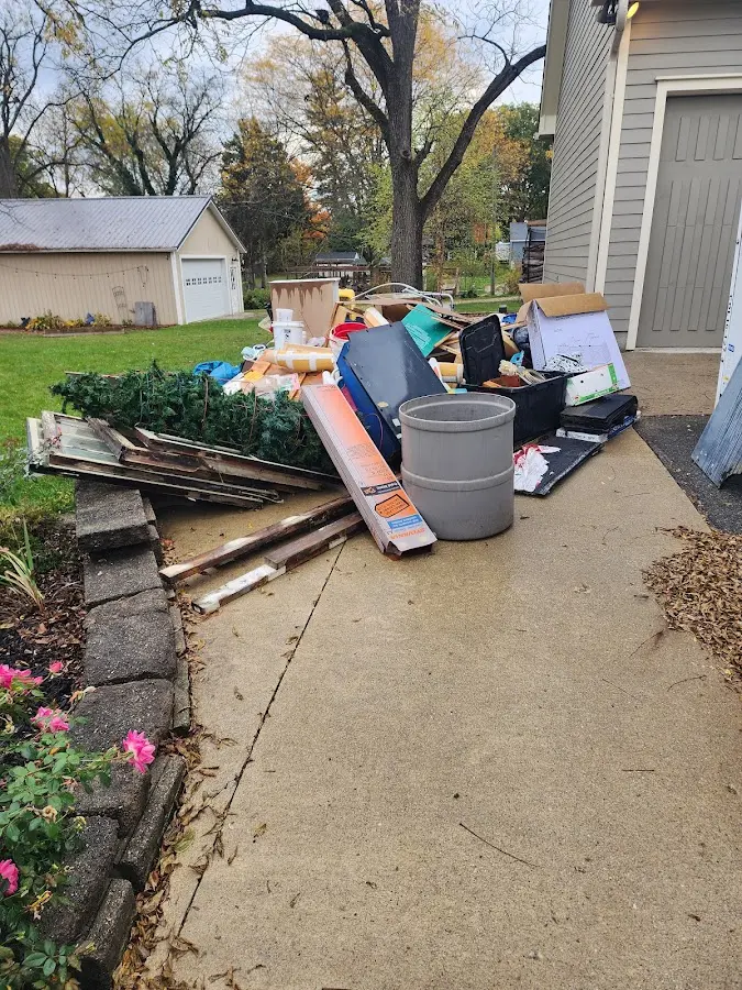 Dumpster being loaded with debris for 30 Yard Dumpster Rental in Haverstraw